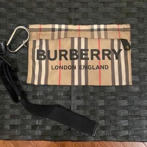 Burberry
Pebble Icon Stripe Wristlet!